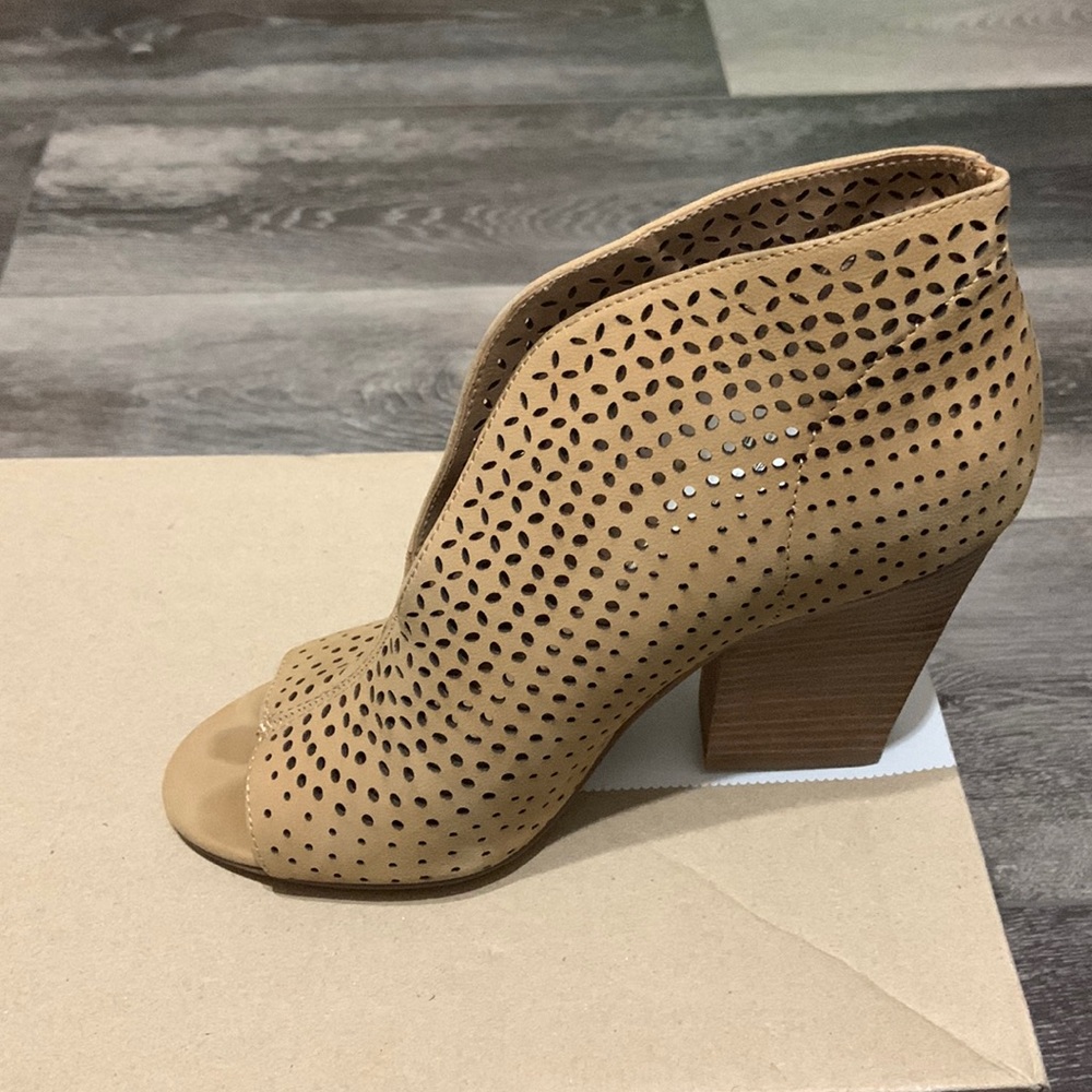 Open slit, peep toe booties. Size US 5.5 wedge heel.